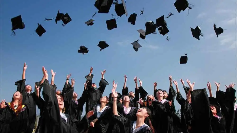 The Importance of Parental Involvement in Promoting Student Behavior and Academic Success 2 Newly Graduated People Wearing Black Academy Gowns Throwing Hats Up in the Air